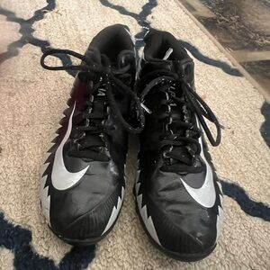 Nike Black and Silver cleat High-Top Design